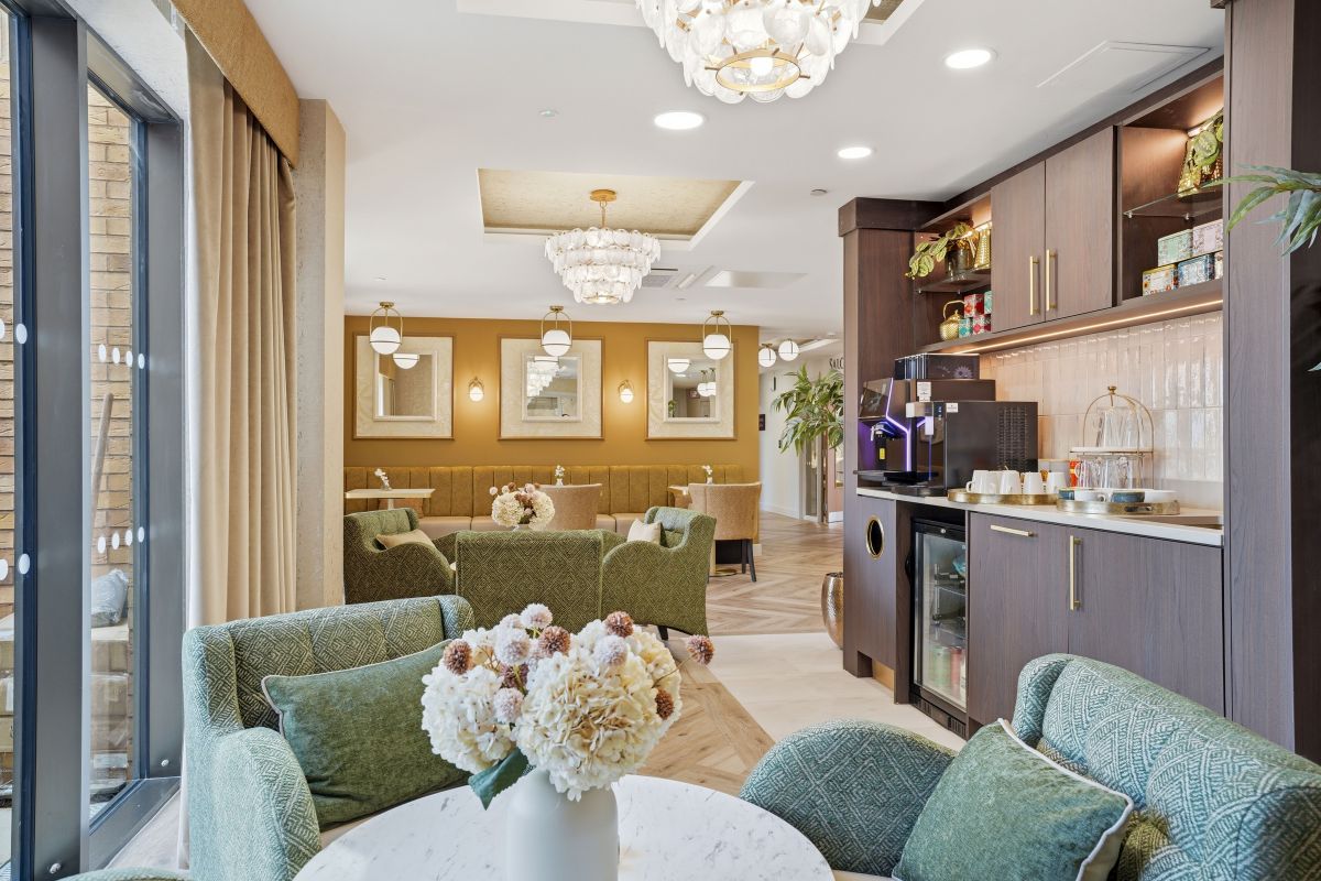 Stylish lounge and café area at Heathview Rose care home in Shirley, with comfortable seating and refreshments